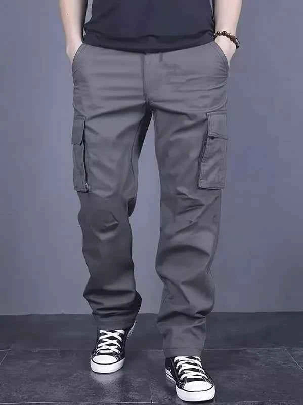 Men's casual multi pocket work pants with loose fit and drawstring waistband suitable for hikingfishingand outdoor exploration