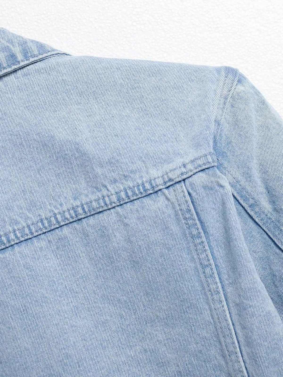 Men's light blue ripped denim jacket. Stylish and trendy. Street casual.