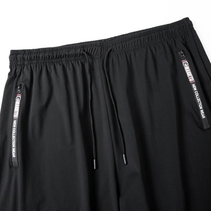 Men's Athletic Stretchy Quick Dry Pants with Zipper Pockets Lightweight Sweatpants for Outdoor Hiking Fishing Running Workout